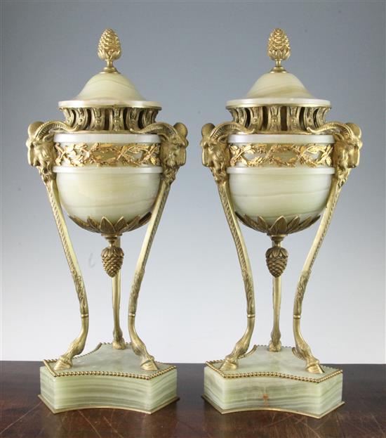 A pair of Empire style ormolu mounted green onyx lidded urns, 18.75in.